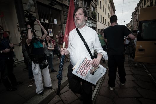 MILAN, ITALY - MAY 1: labor day held in Milan on May 1, 2013. Every year thousands of people taking to the streets to celebrate labor day and to protest against italian austerity