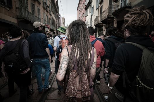 MILAN, ITALY - MAY 1: labor day held in Milan on May 1, 2013. Every year thousands of people taking to the streets to celebrate labor day and to protest against italian austerity