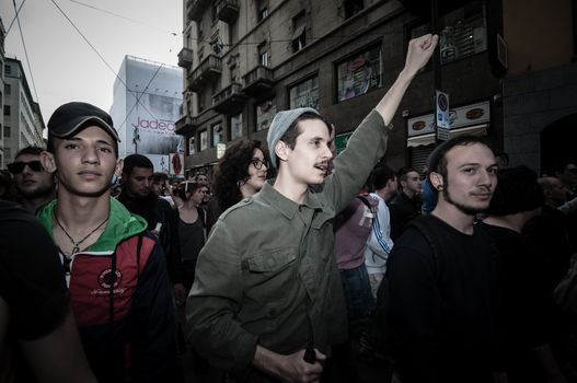 MILAN, ITALY - MAY 1: labor day held in Milan on May 1, 2013. Every year thousands of people taking to the streets to celebrate labor day and to protest against italian austerity