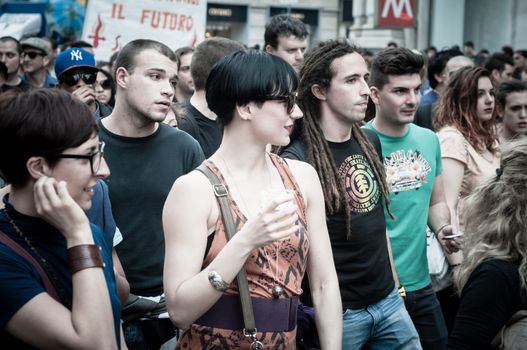 MILAN, ITALY - MAY 1: labor day held in Milan on May 1, 2013. Every year thousands of people taking to the streets to celebrate labor day and to protest against italian austerity