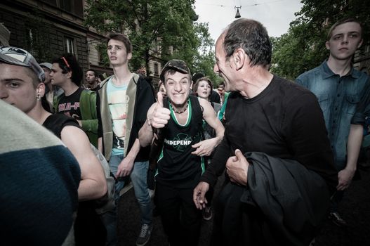 MILAN, ITALY - MAY 1: labor day held in Milan on May 1, 2013. Every year thousands of people taking to the streets to celebrate labor day and to protest against italian austerity