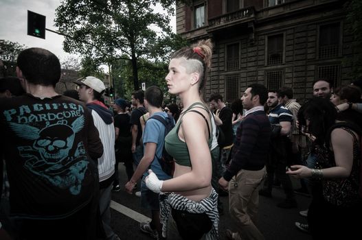 MILAN, ITALY - MAY 1: labor day held in Milan on May 1, 2013. Every year thousands of people taking to the streets to celebrate labor day and to protest against italian austerity