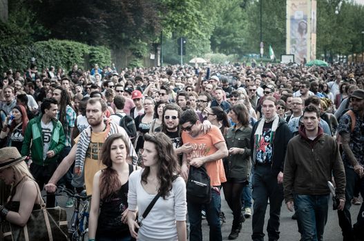 MILAN, ITALY - MAY 1: labor day held in Milan on May 1, 2013. Every year thousands of people taking to the streets to celebrate labor day and to protest against italian austerity