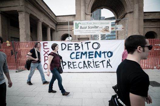 MILAN, ITALY - MAY 1: labor day held in Milan on May 1, 2013. Every year thousands of people taking to the streets to celebrate labor day and to protest against italian austerity