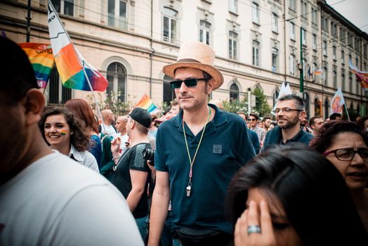 MILAN, ITALY - JUNE 29: gay pride manifestation in Milan June 29, 2013. Normal people, gay, lesbians, transgenders and bisexuals take to the street for their rights organizing a street parade party