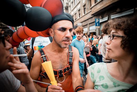 MILAN, ITALY - JUNE 29: gay pride manifestation in Milan June 29, 2013. Normal people, gay, lesbians, transgenders and bisexuals take to the street for their rights organizing a street parade party