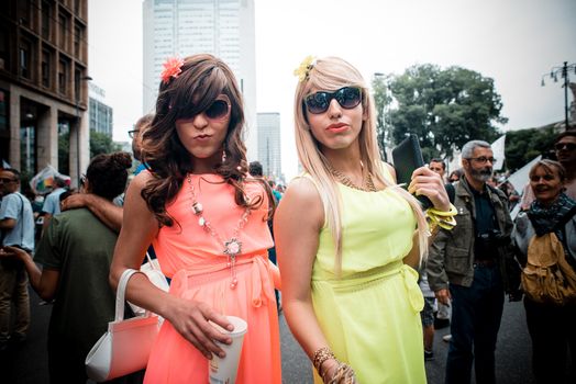 MILAN, ITALY - JUNE 29: gay pride manifestation in Milan June 29, 2013. Normal people, gay, lesbians, transgenders and bisexuals take to the street for their rights organizing a street parade party