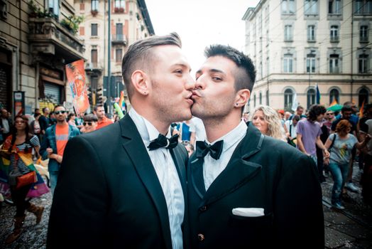 MILAN, ITALY - JUNE 29: gay pride manifestation in Milan June 29, 2013. Normal people, gay, lesbians, transgenders and bisexuals take to the street for their rights organizing a street parade party