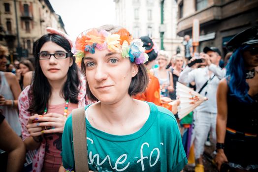 MILAN, ITALY - JUNE 29: gay pride manifestation in Milan June 29, 2013. Normal people, gay, lesbians, transgenders and bisexuals take to the street for their rights organizing a street parade party