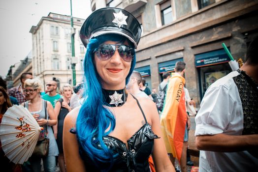 MILAN, ITALY - JUNE 29: gay pride manifestation in Milan June 29, 2013. Normal people, gay, lesbians, transgenders and bisexuals take to the street for their rights organizing a street parade party