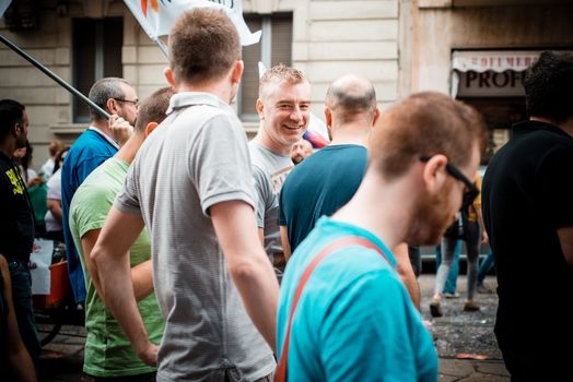 MILAN, ITALY - JUNE 29: gay pride manifestation in Milan June 29, 2013. Normal people, gay, lesbians, transgenders and bisexuals take to the street for their rights organizing a street parade party