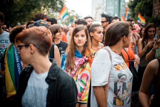 MILAN, ITALY - JUNE 29: gay pride manifestation in Milan June 29, 2013. Normal people, gay, lesbians, transgenders and bisexuals take to the street for their rights organizing a street parade party