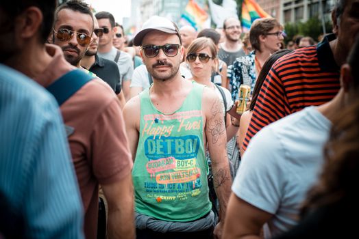 MILAN, ITALY - JUNE 29: gay pride manifestation in Milan June 29, 2013. Normal people, gay, lesbians, transgenders and bisexuals take to the street for their rights organizing a street parade party