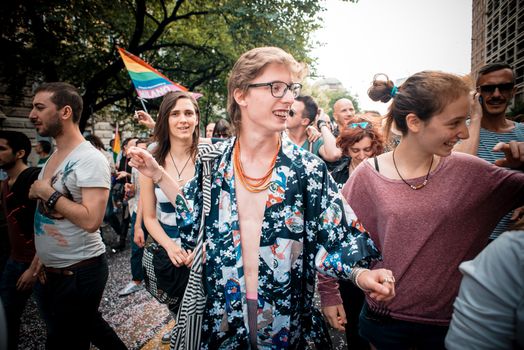 MILAN, ITALY - JUNE 29: gay pride manifestation in Milan June 29, 2013. Normal people, gay, lesbians, transgenders and bisexuals take to the street for their rights organizing a street parade party