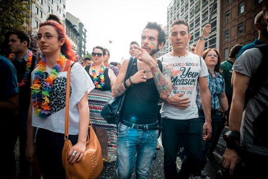 MILAN, ITALY - JUNE 29: gay pride manifestation in Milan June 29, 2013. Normal people, gay, lesbians, transgenders and bisexuals take to the street for their rights organizing a street parade party