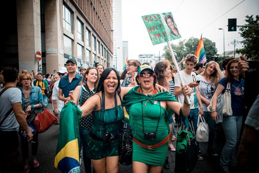 MILAN, ITALY - JUNE 29: gay pride manifestation in Milan June 29, 2013. Normal people, gay, lesbians, transgenders and bisexuals take to the street for their rights organizing a street parade party