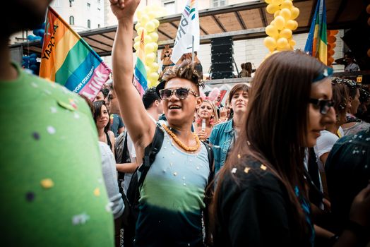 MILAN, ITALY - JUNE 29: gay pride manifestation in Milan June 29, 2013. Normal people, gay, lesbians, transgenders and bisexuals take to the street for their rights organizing a street parade party