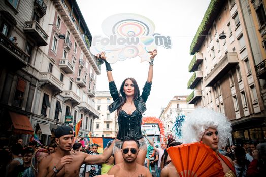 MILAN, ITALY - JUNE 29: gay pride manifestation in Milan June 29, 2013. Normal people, gay, lesbians, transgenders and bisexuals take to the street for their rights organizing a street parade party