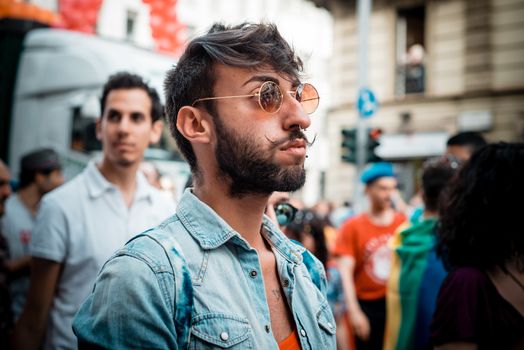 MILAN, ITALY - JUNE 29: gay pride manifestation in Milan June 29, 2013. Normal people, gay, lesbians, transgenders and bisexuals take to the street for their rights organizing a street parade party