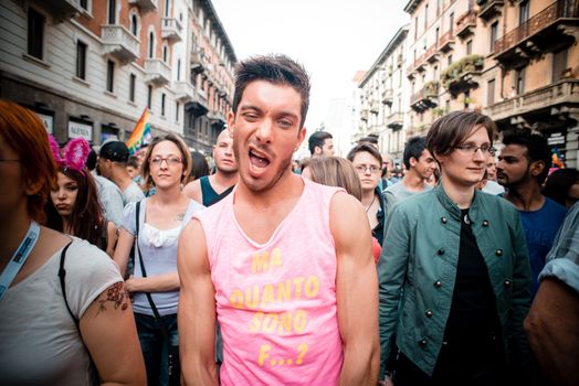 MILAN, ITALY - JUNE 29: gay pride manifestation in Milan June 29, 2013. Normal people, gay, lesbians, transgenders and bisexuals take to the street for their rights organizing a street parade party