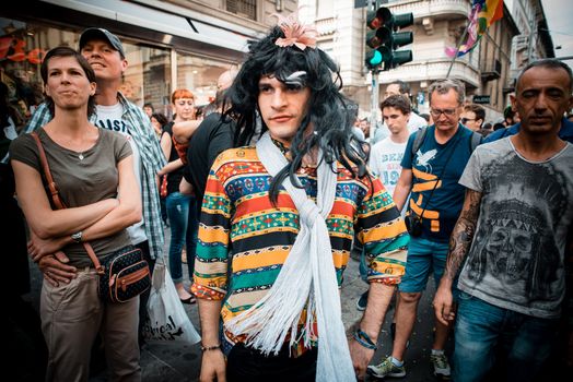 MILAN, ITALY - JUNE 29: gay pride manifestation in Milan June 29, 2013. Normal people, gay, lesbians, transgenders and bisexuals take to the street for their rights organizing a street parade party