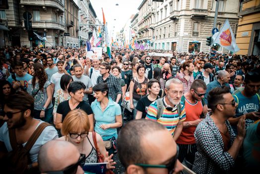 MILAN, ITALY - JUNE 29: gay pride manifestation in Milan June 29, 2013. Normal people, gay, lesbians, transgenders and bisexuals take to the street for their rights organizing a street parade party