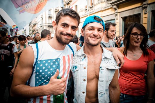 MILAN, ITALY - JUNE 29: gay pride manifestation in Milan June 29, 2013. Normal people, gay, lesbians, transgenders and bisexuals take to the street for their rights organizing a street parade party