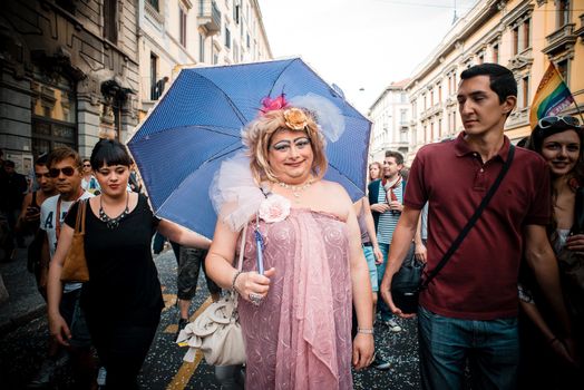 MILAN, ITALY - JUNE 29: gay pride manifestation in Milan June 29, 2013. Normal people, gay, lesbians, transgenders and bisexuals take to the street for their rights organizing a street parade party