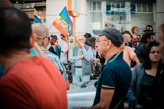 MILAN, ITALY - JUNE 29: gay pride manifestation in Milan June 29, 2013. Normal people, gay, lesbians, transgenders and bisexuals take to the street for their rights organizing a street parade party