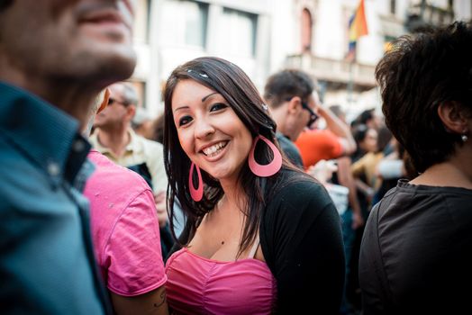 MILAN, ITALY - JUNE 29: gay pride manifestation in Milan June 29, 2013. Normal people, gay, lesbians, transgenders and bisexuals take to the street for their rights organizing a street parade party