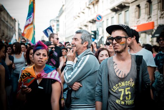 MILAN, ITALY - JUNE 29: gay pride manifestation in Milan June 29, 2013. Normal people, gay, lesbians, transgenders and bisexuals take to the street for their rights organizing a street parade party