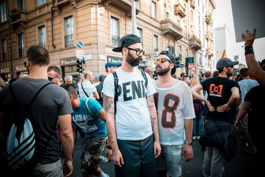 MILAN, ITALY - JUNE 29: gay pride manifestation in Milan June 29, 2013. Normal people, gay, lesbians, transgenders and bisexuals take to the street for their rights organizing a street parade party