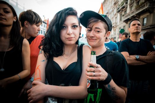 MILAN, ITALY - JUNE 29: gay pride manifestation in Milan June 29, 2013. Normal people, gay, lesbians, transgenders and bisexuals take to the street for their rights organizing a street parade party