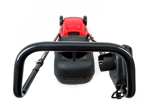 new red lawnmower isolated on white, studio shoot