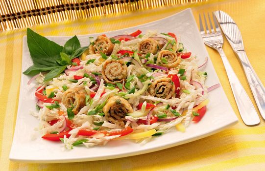 Scrambled eggs with green onions, fresh vegetables and sesame seeds