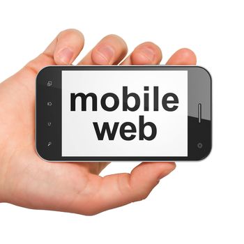 Web development concept: hand holding smartphone with word Mobile Web on display. Generic mobile smart phone in hand on White background.