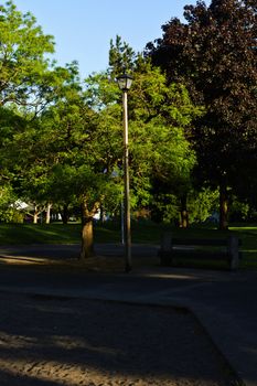 Public park in a neighborhood at sunset.