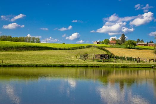 Green landscape and blue lake and sky, Prigorje region, Croatia