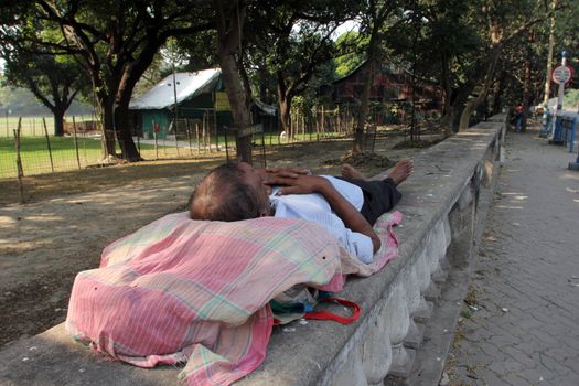 Homeless people sleeping on the footpath of Kolkata. on November 25, 2012 in Kolkata, India.