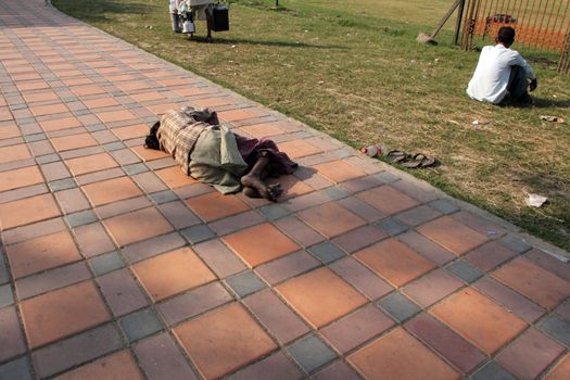 Homeless people sleeping on the footpath of Kolkata. on November 25, 2012 in Kolkata, India.