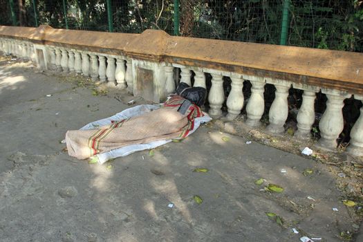 Homeless people sleeping on the footpath of Kolkata. on November 25, 2012 in Kolkata, India.
