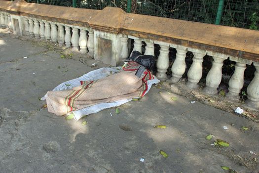 Homeless people sleeping on the footpath of Kolkata. on November 25, 2012 in Kolkata, India.