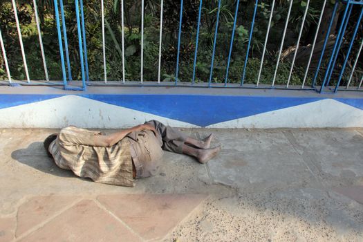 Homeless people sleeping on the footpath of Kolkata. on November 25, 2012 in Kolkata, India.