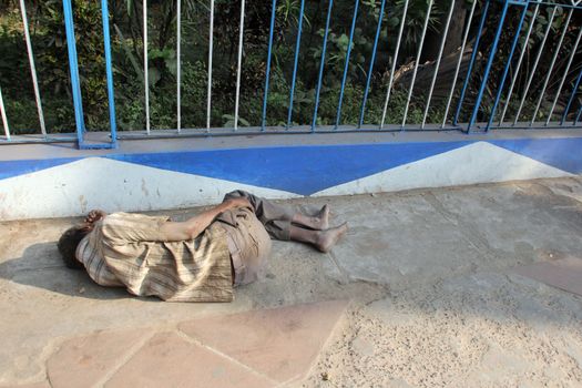 Homeless people sleeping on the footpath of Kolkata. on November 25, 2012 in Kolkata, India.