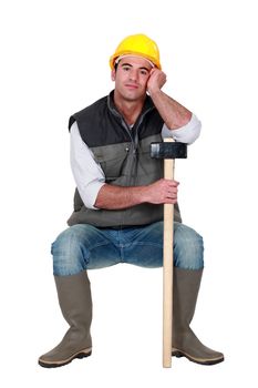 Construction worker with a sledgehammer