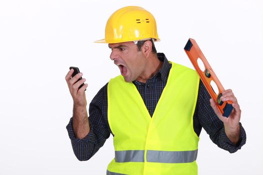 Irate builder shouting down phone