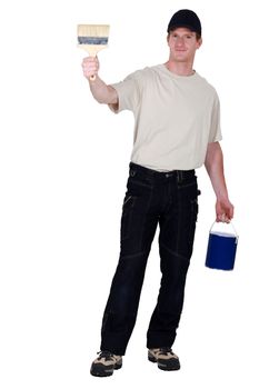 craftsman painter holding a roller and a can