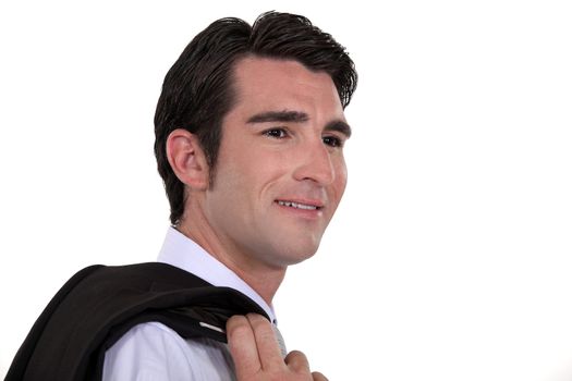 Businessman with his jacket over his shoulder