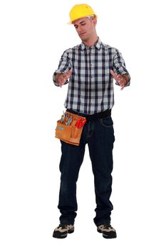 Tradesman holding an invisible object
