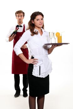 Waiter and waitress with a drinks tray